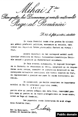 O copie după actul de abdicare semnat de Regele Mihai la 30 decembrie 1947, șantajat fiind cu asasinate în masă. „Baie de sânge” a fost una din expresiile folosite de Petru Groza.
