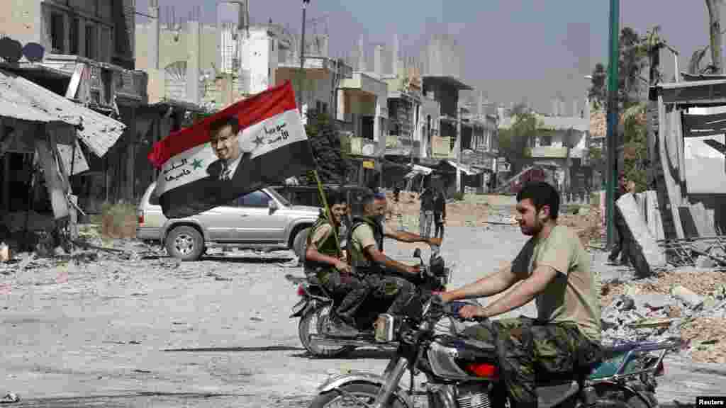 Sirija - Snage lojalne predsjedniku Bašar al-Assadu,Qusair, 5. juni 2013. Foto:  REUTERS / Mohammed Azakir