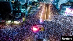 Israelienii protestează față de o reformă judiciară inițiată de guvernul lui Benjamin Netanyahu, Tel Aviv, 25 martie 2023