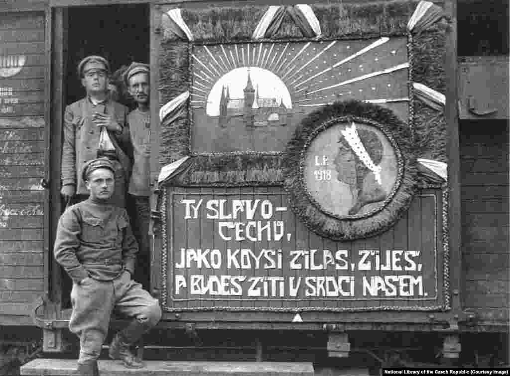 Others were decorated with images of home. This door depicts the Prague Castle above the message, &ldquo;You, glory of the Czechs, as you used to live, you live and will live on in our hearts.&rdquo;