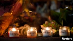 Candles at a memorial on Boston's Boylston Street on April 21 dedicated to those who died in the Boston Marathon bombings on April 15 and the MIT campus police officer killed four days later.