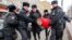 Russian police officers detain a protester during a rally to demand freedom for political prisoners in Moscow earlier this year. 