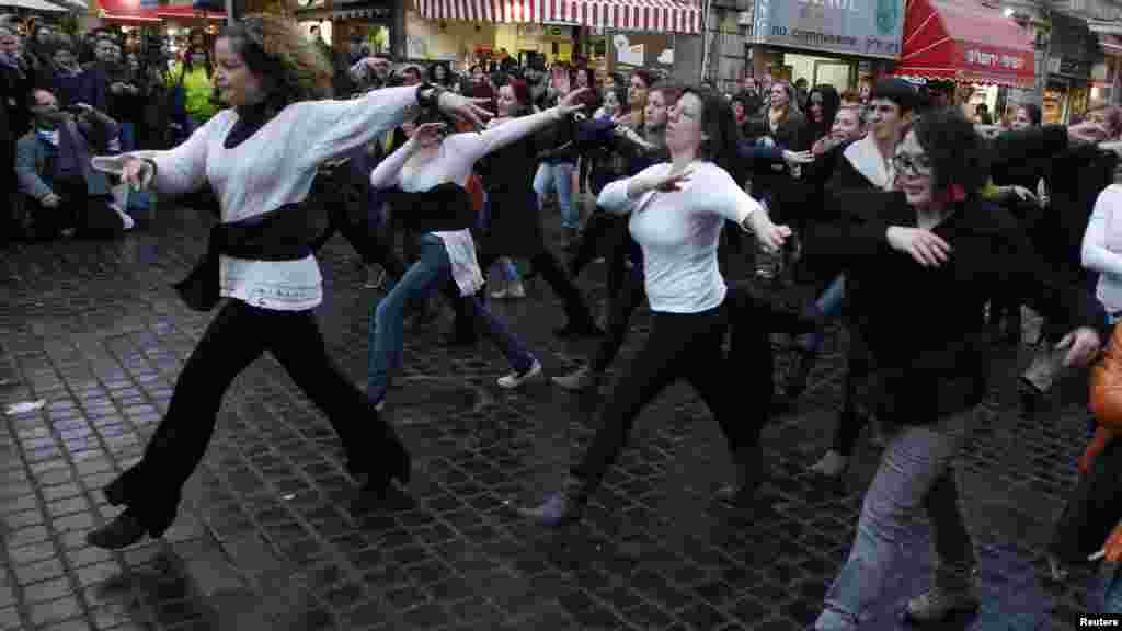 Women in Jerusalem dance during a flash mob demonstration on January 17 against ultraorthodox Jews seeking gender separation in Israel. (REUTERS/Baz Ratner)