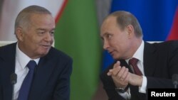 Ўзбекистон президенти Ислом Каримов (ч) ва Россия президенти Владимир Путин (ў).