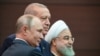 რუსეთის პრეზიდენტი პუტინი (მარცხნივ), თურქეთის პრეზიდენტი - რეჯეპ ტაიპ ერდოანი, ირანის პრეზიდენტი ჰასან როუჰანი -ანკარა, თურქეთი. 16 სექტემბერი, 2019 წელი