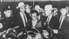Lee Harvey Oswald gjatë një konference shtypi një ditë pas arrestimit të tij në Dallas, më 22 nëntor, 1963.