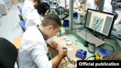 Armenia - Workers at a tech company based in the Engineering City in Yerevan, August 22, 2018.