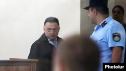 Armenia -- District court judge Davit Grigorian leaves the courtroom after ordering former President Robert Kocharian's release from prison, May 18, 2019.