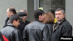 People line up outside an exchange office in Armenia earlier this month.