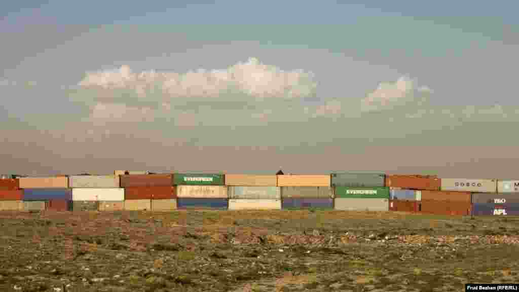 A huge row of shipping containers outside Bagram Airfield.&nbsp;