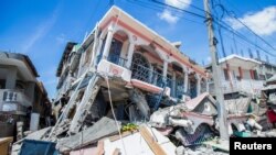  Дома, уничтоженные после землетрясение магнитудой 7,2 в Les Cayes, Haiti 14 августа, 2021 года. 