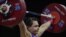 Олимпийская чемпионка Светлана Подобедова во время соревнований по тяжелой атлетике в Лондоне. 3 августа 2012 года.