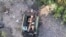 Ukraine - Military commander Vladyslav Polskiy rescued two wounded soldiers from the "kill zone" near the front lines. Reuters screen grab
