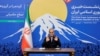 Iran's President Masoud Pezeshkian attends a press conference in Tehran