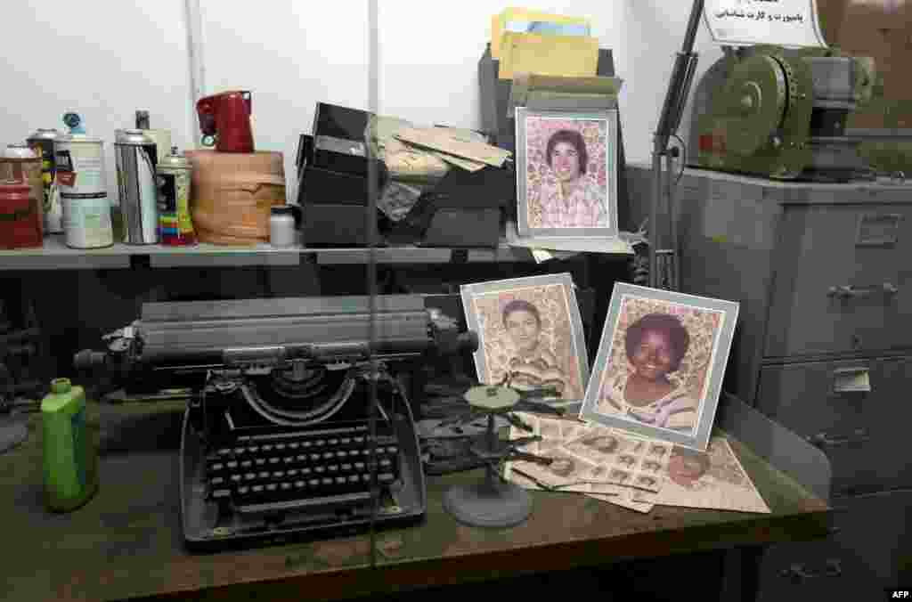 Typewriters and photographs that belonged to American diplomatic staff are on display.