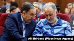 Former Tehran Mayor Mohammad Ali Najafi and his attorney Hamid Goudarzi in the third session of Najafi's trial on July 22, 2019.