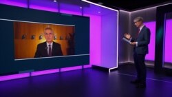 Former NATO chief Jens Stoltenberg talking to RFE/RL on November 7