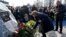 Mourners attend the unveiling of a memorial for those who died in the crash of Ukraine International Airlines Flight 752 at the Boryspil International airport outside Kyiv on February 17.