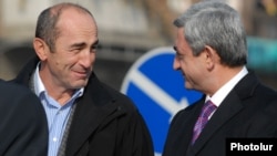 Armenia - President Serzh Sarkisian (R) and his predecessor Robert Kocharian at an official ceremony near Yerevan, 03Dec2008.