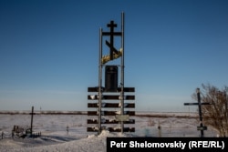 A memorial to Ukrainian gulag prisoners near the abandoned Yurshor town in Vorkuta