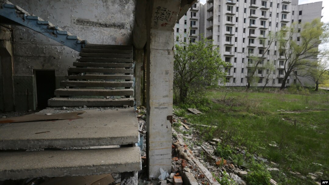 Заброшенные дома в Припяти, городе, население которого было полностью эвакуировано из-за аварии на ЧАЭС 
