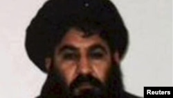Mullah Akhtar Mohammad Mansur, Taliban militants' new leader, is seen in this undated handout photograph by the Taliban
