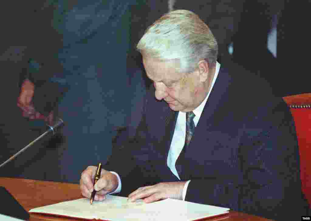 Yeltsin signing the protocol agreement on the creation of the CIS in Almaty on December 21, 1991 (TASS) - Events moved quickly. Less than two weeks after the Belarus summit, the heads of 11 Soviet republics -- all but the Baltic states and Georgia -- met in the Kazakh capital and formally created the commonwealth. In December 1993, Georgia joined, while in August 2005, Turkmenistan downgraded its participation to associate membership.