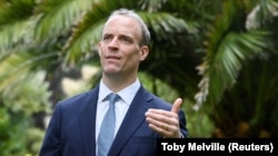 U.K. Foreign Secretary Dominic Raab gestures during an interview with Reuters on the sidelines of the G7 summit in Carbis Bay, Cornwall, on June 11.