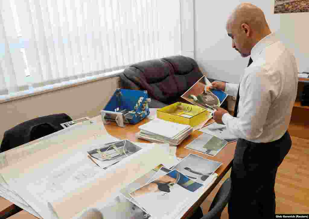 Mustafa Nayyem, the deputy director general of Ukroboronprom, looks over ventilator designs retrieved from the Burevisnyk plant.