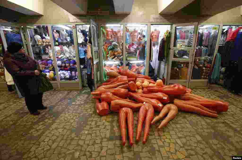 Mannequins on the floor outside a shop in an underground passage in Moscow. (Reuters/Maxim Zmeyev)