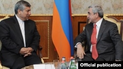 Armenia - President Serzh Sarkisian (R) meets with Iran's Energy Minister Majid Namjou in Yerevan, 2Jun2012.