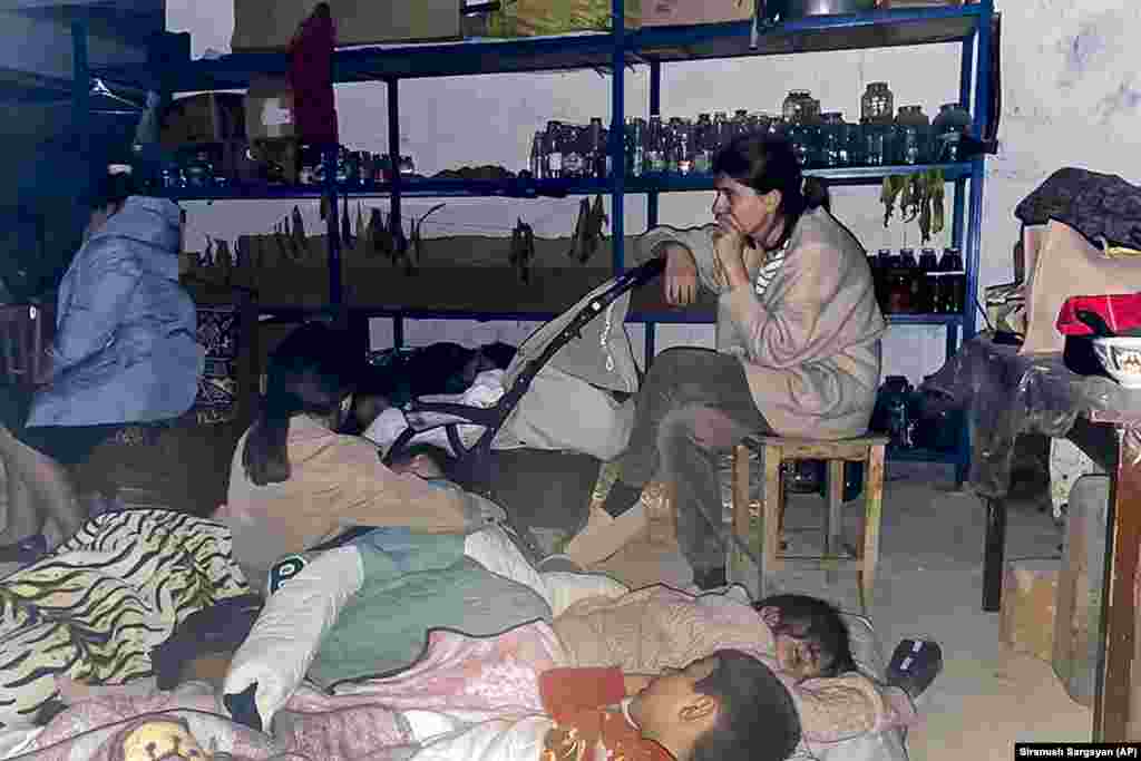 Children sleep in a shelter during shelling in Stepanakert. Azerbaijan&rsquo;s Defense Ministry said on September 19 that &quot;only legitimate military targets are being destroyed,&quot; and the Foreign Ministry said the only path to peace in the region was the complete withdrawal of Armenian forces from the territory. &nbsp;