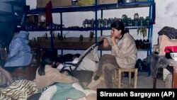 Children sleep in a shelter during shelling in Stepanakert in Nagorno-Karabakh in the early hours of September 20.