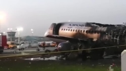 Rusia publică imagini cu avionul distrus de flăcări