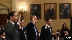 Professors Noah Feldman, (left to right) Pamela Karlan, Michael Gerhardt, and Jonathan Turley take the oath during a House Judiciary Committee hearing on Capitol Hill in Washington, D.C., on December 4.