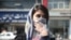 An Iranian woman in Iran covers her face amid a coronavirus outbreak in the Middle Eastern Country. 