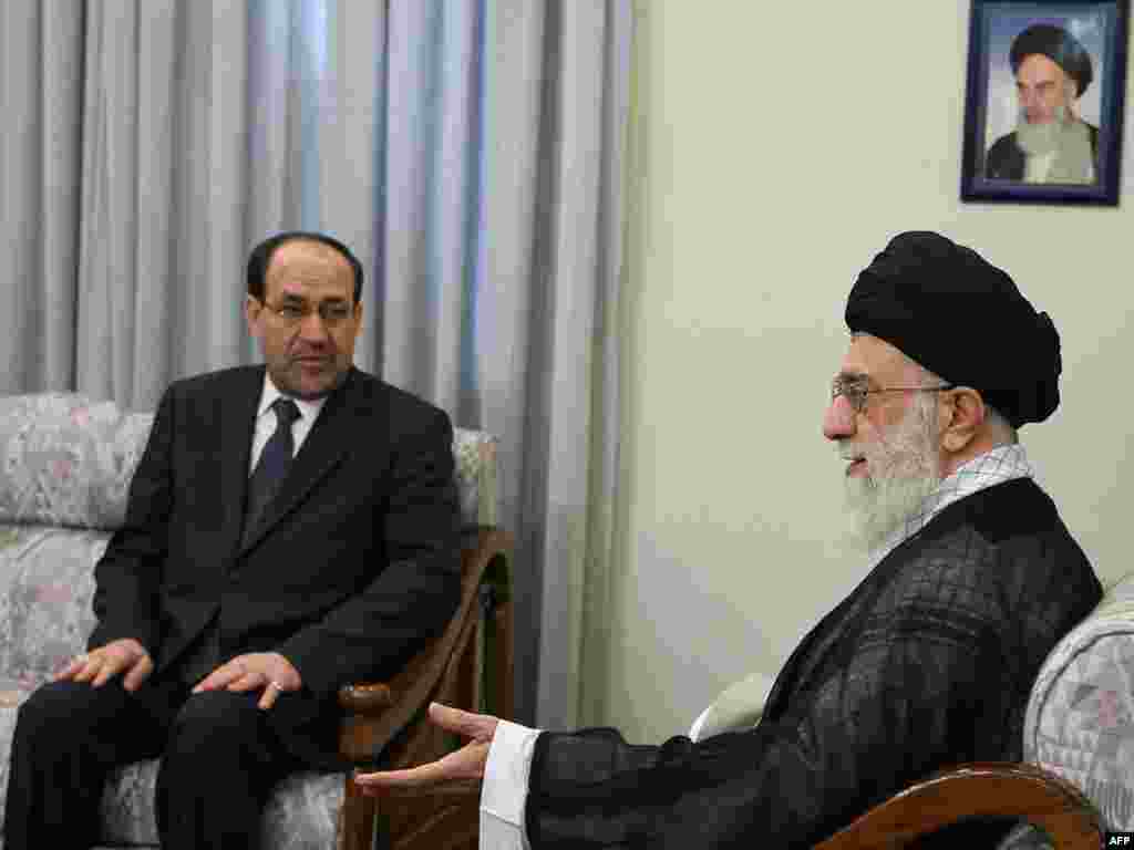 Iran -- Supreme leader Ayatollah Ali Khamenei (R) meets with Iraqi Prime Minister Nuri al-Maliki in Tehran, 18Oct2010 - IRAN, Tehran : A picture released by the official website of Iran's supreme leader Ayatollah Ali Khamenei (R) shows him meeting with Iraqi Prime Minister Nuri al-Maliki on October 18, 2010 in Tehran, the second stop of the latter's regional tour aimed at garnering support for his premiership bid, as his chief rival Iyad accused Iran of meddling in Baghdad's political affairs. AFP PHOTO/HO/KHAMENEI.IR