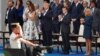 Дональд Трамп и Эммануэль Макрон с супругами наблюдают за военным парадом в День взятия Бастилии в Париже 14 июля 2017 