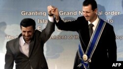 د سوريې ولسمشر بشارالاسد له خپل ايراني ساري احمدي نژاد سره