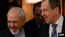 Министр иностранных дел Ирана Джавад Зариф (слева) и глава МИД России Сергей Лавров. Москва, 16 января 2014 года.