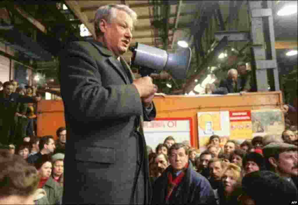 Russian President Boris Yeltsin addresses a crowd of workers at the Kirov plant in Leningrad on March 23, 1991 (AFP) - Yeltsin was brought to Moscow from the Urals city of Sverdlovsk by Soviet leader Mikhail Gorbachev, who was seeking to reinvigorate the Soviet leadership. The two men fell out, however, and a bitter power struggle ensued as Gorbachev fought to save the Soviet Union.