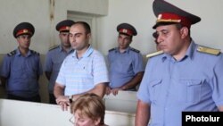 Armenia -- Ashot Harutiunian, a police officer, at the start of his trial on charges stemming from the April 13 death of a man in police custody, 6July 2010.