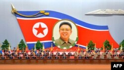 North Korea - An overview of a national meeting at the April 25 House of Culture to mark the 20th anniversary of late North Korean leader Kim Jong-Il's election as chairman of the DPRK National Defence Commission, Pyongyang, 08Apr2013