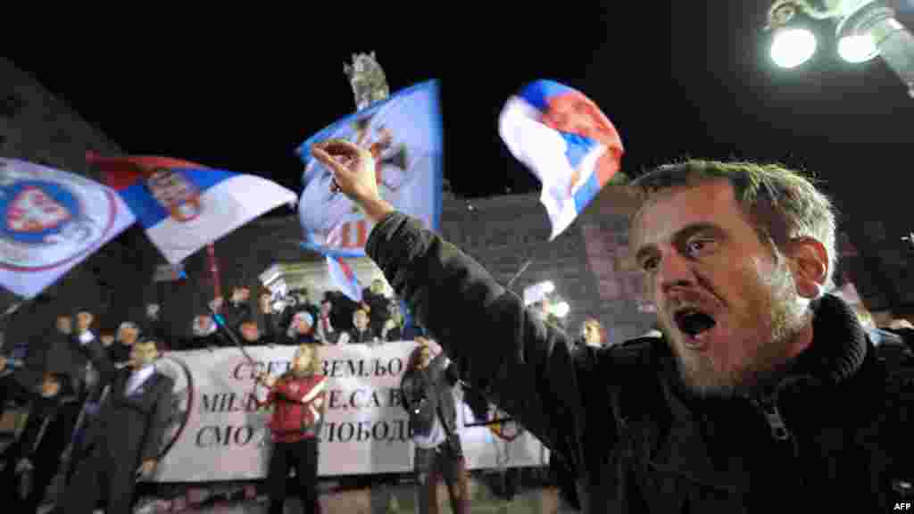 A Serbian ultranationalist shouts slogans during a protest rally in Belgrade after a UN court cleared Kosovo&#39;s former Prime Minister Ramush Haradinaj of war crimes committed during the 1998-99 conflict. A UN war crimes court cleared Haradinaj of murder and torture during the 1990s war of independence, enraging Belgrade with the second such acquittal in two weeks. (AFP/Alexa Stankovic)