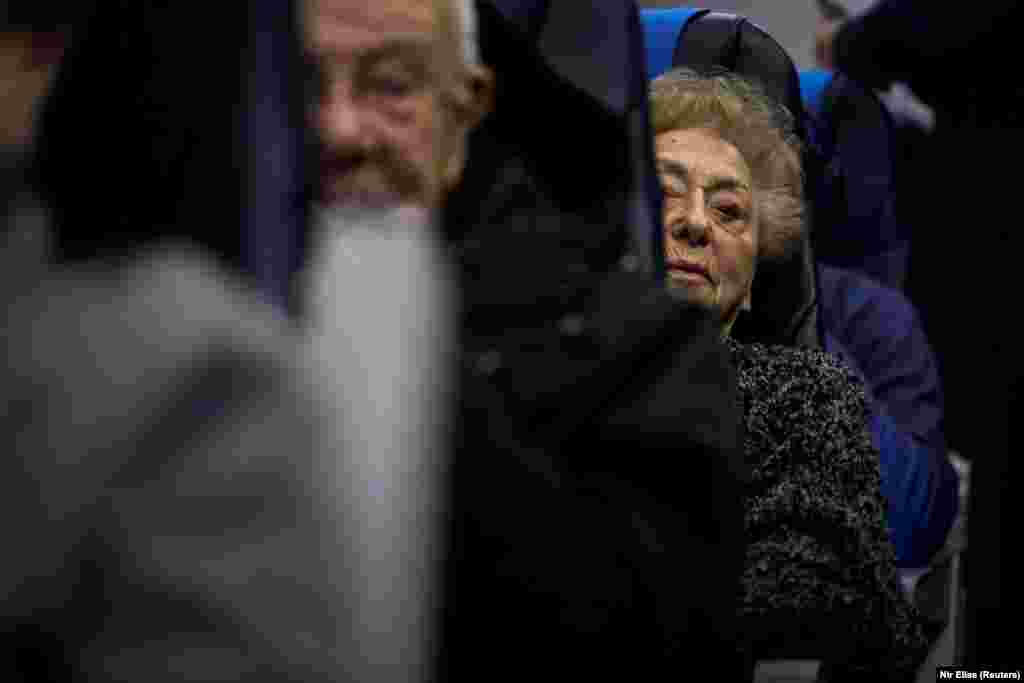 Jona Laks sits in the plane during a flight from Israel to visit Auschwitz death camp in Oswiecim, Poland January 25, 2020. At every step of the journey, her emotions built up.