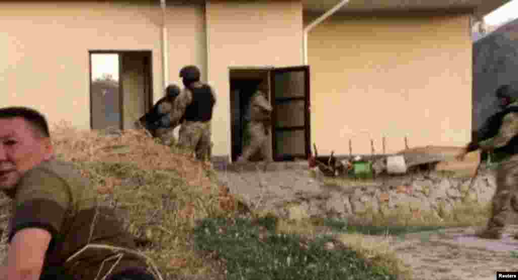 Special-forces troops during the operation to detain former Kyrgyz President Almazbek Atambaev in the village of Koi-Tash, near Bishkek