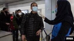 تصویری از کنترل مسافران ورودی از چین در فرودگاه تهران