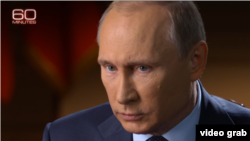 Владимир Путин во время интервью Чарли Роузу