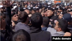 Armenia - Supporters of Samvel Karapetian scuffle with riot police, Yerevan, April 17, 2026.