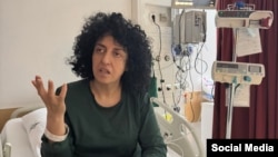 An undated photo of Iranian Nobel laureate Narges Mohammadi in a hospital.